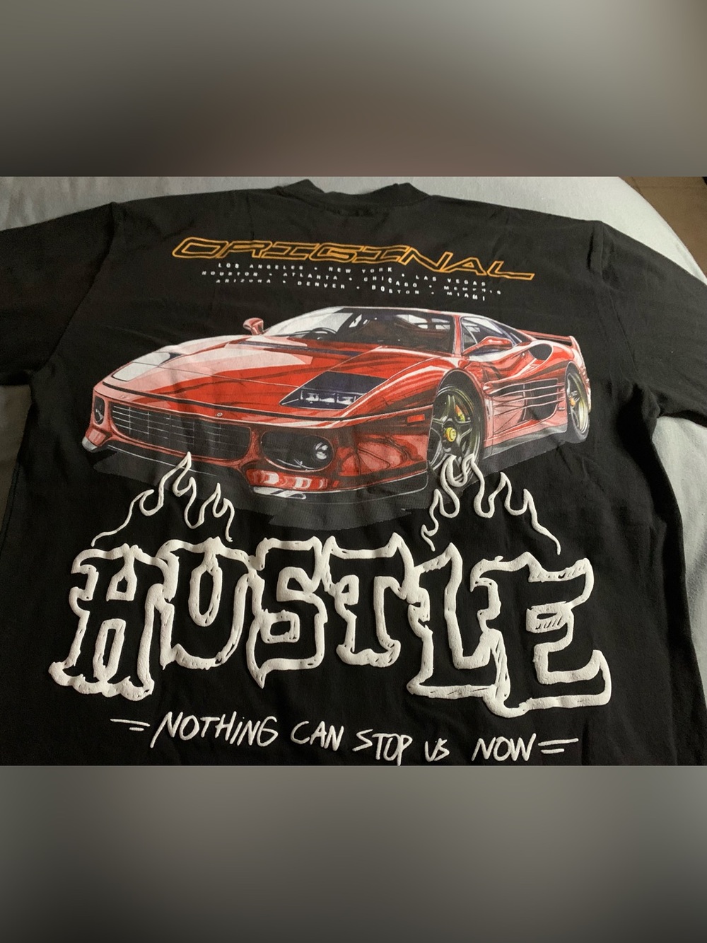 Black Long-Sleeve 'HUSTLE' Graphic Tee with Red Sports Car Print